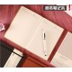 A5 Moleskine-like hard-cover business grid notebook with elastic band. A5 Moleskine-like hard-cover business grid notebook with elastic band.