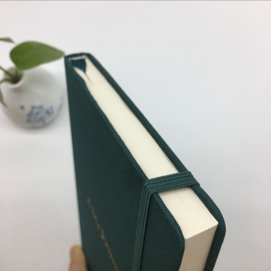 Shanghai Tangge Book Factory's A5 notebook with fabric texture and mounting, simple waistband and logo. Shanghai Tangge Book Factory's A5 notebook with fabric texture and mounting, simple waistband and logo.