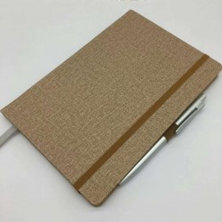 Hardcover hardcover grooved mounted notebook with eco-friendly cloth binding, gold-stamped logo on the cover, and white double-adhesive eye protection paper