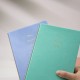A5 hardcover imitation leather notebook with a mounted spine and gold-stamped logo, dot-matrix paper, and sewn binding A5 hardcover imitation leather notebook with a mounted spine and gold-stamped logo, dot-matrix paper, and sewn binding