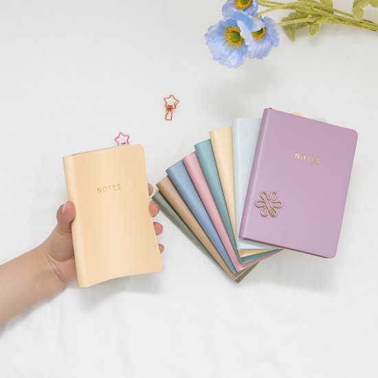 Portable mini pocket notebook A6 notebook with gold-stamped logo. Portable mini pocket notebook A6 notebook with gold-stamped logo.