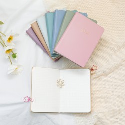 Portable mini pocket notebook A6 notebook with gold-stamped logo.