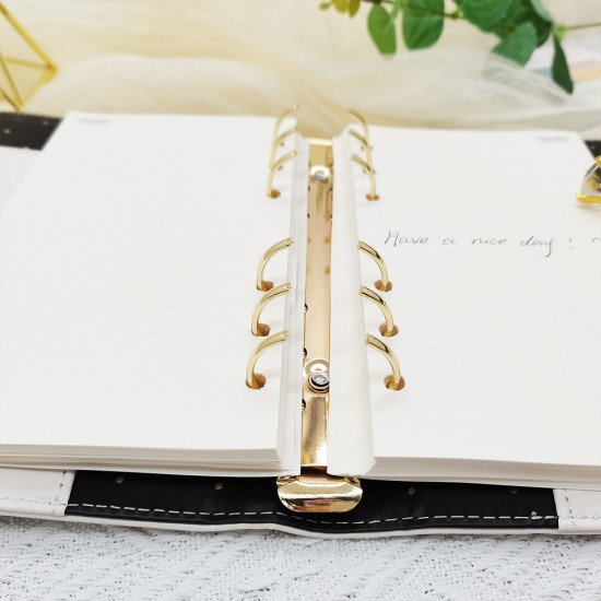 2022 source A6 loose-leaf notebooks, high-quality polka-dot textured PU notebooks with gold clips. 2022 source A6 loose-leaf notebooks, high-quality polka-dot textured PU notebooks with gold clips.