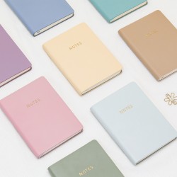 Portable mini pocket notebook A6 notebook with gold-stamped logo.