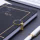 Marble-printed notebook with round gold magnetic clasp, factory-customized logo embossing