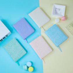 Factory-made, cross-border cork-grain notebooks with bindings and lined strips for export, eco-friendly sawdust-grain diaries with logo print.